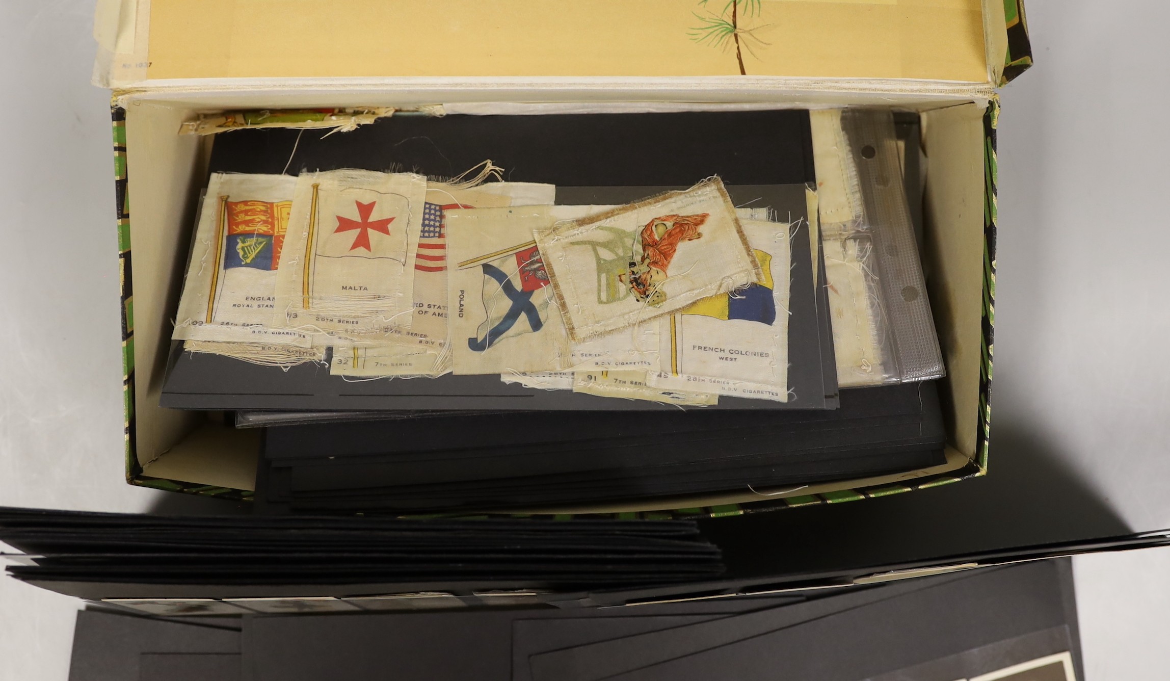 A collection of cigarette cards and silks; to include bathing beauties and stars of stage and screen from the 1920’s